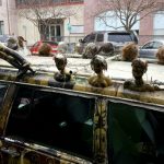 Petaluma streets - Volvo station wagon decorated with doll heads